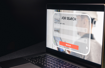 Job seeker with sign